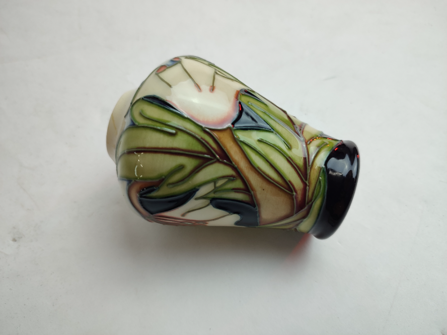Discover our collection of Moorcroft vases by Sian Gibson. This 10cm piece in excellent condition awaits you. Shop today for these sought-after ceramics!