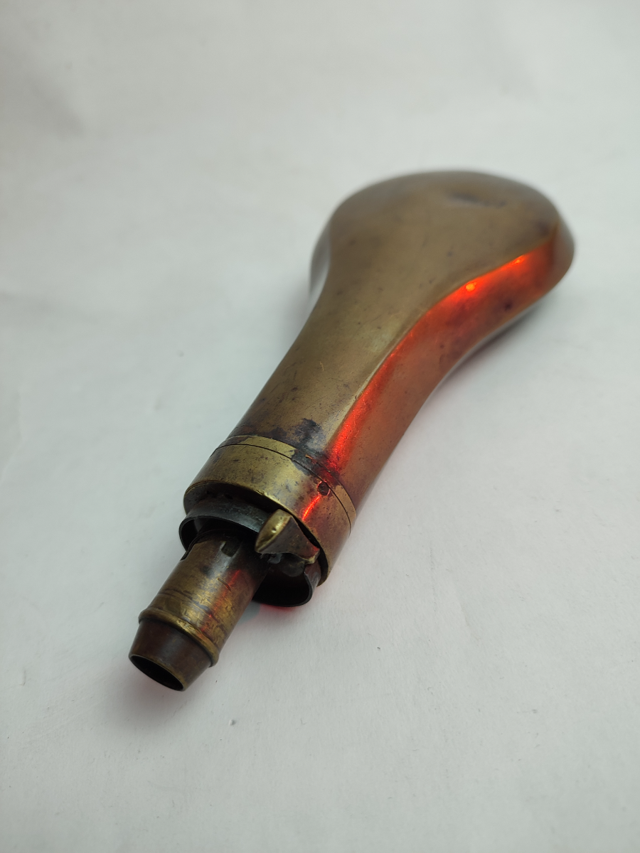 Discover our selection of mid 19th century gun powder flasks. Unique designs, intriguing history. Shop now for your collectible powder flask!