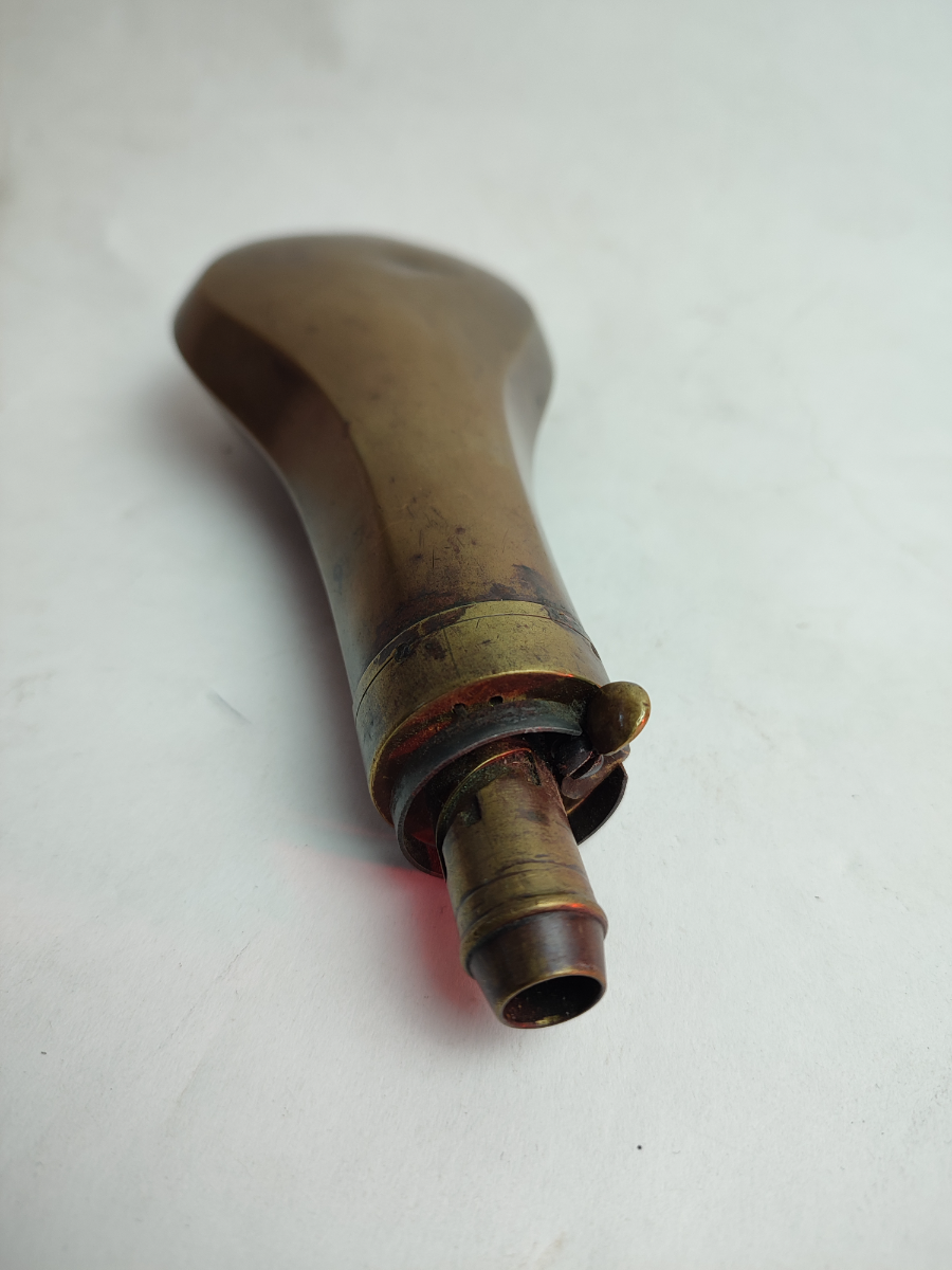 Discover our selection of mid 19th century gun powder flasks. Unique designs, intriguing history. Shop now for your collectible powder flask!