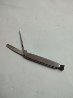 Foldable 20th Century Nail Filer.