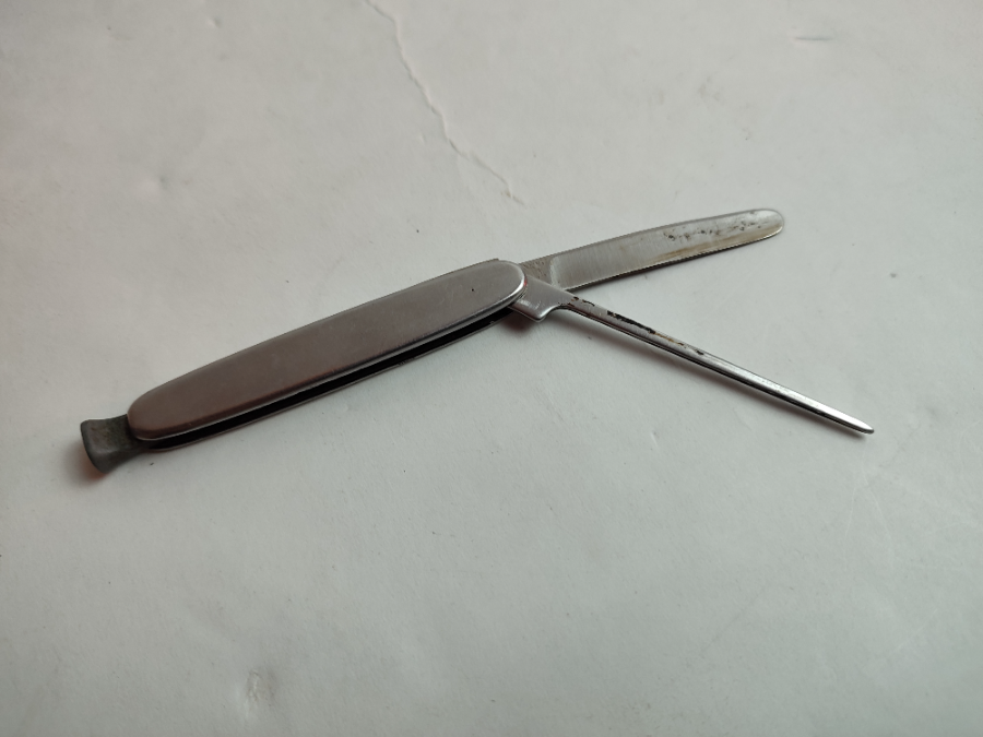 Foldable 20th Century Nail Filer.