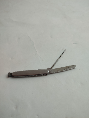 Foldable 20th Century Nail Filer.