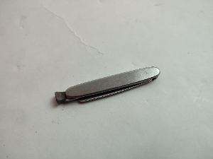 Foldable 20th Century Nail Filer.