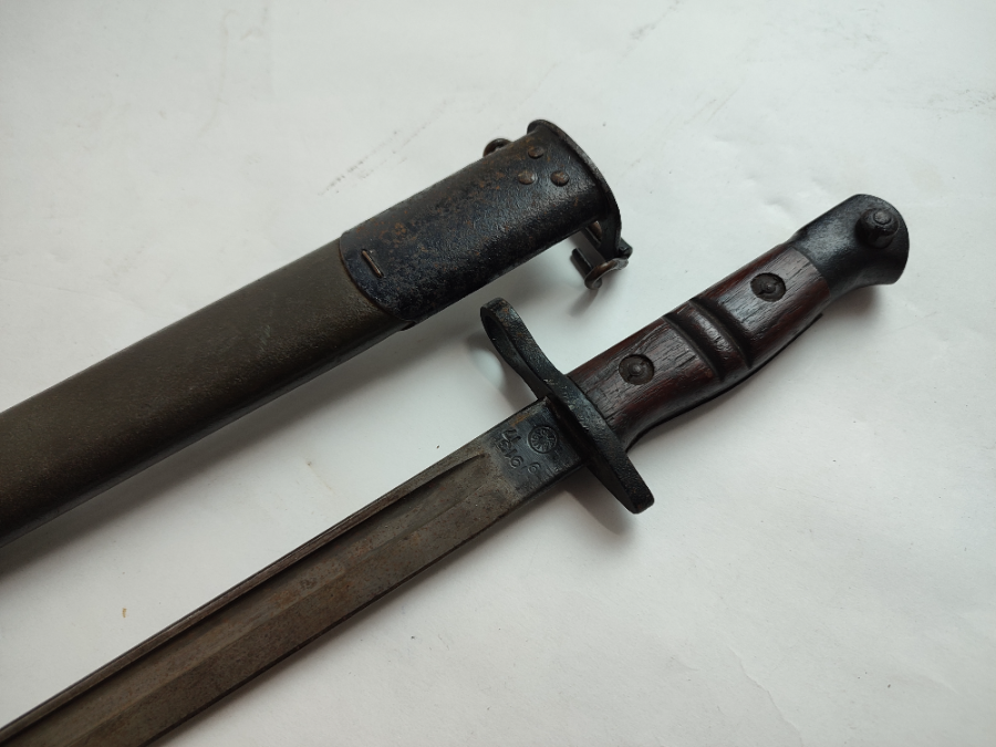 Discover a rich piece of history with our American pattern 1913 bayonet, dated September 1917. In good condition. Shop now for a step back in time!