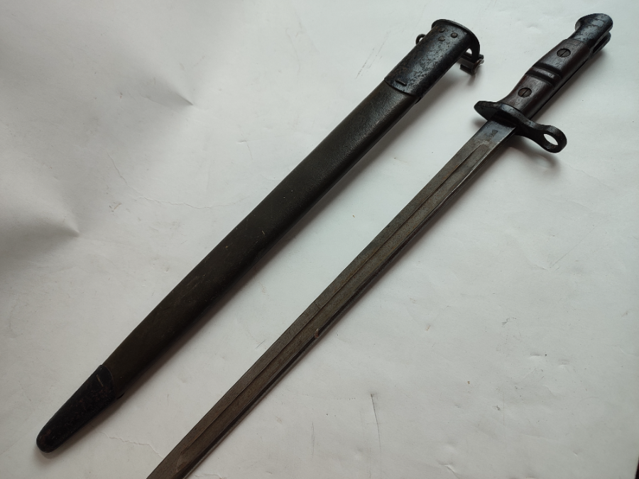 Discover a rich piece of history with our American pattern 1913 bayonet, dated September 1917. In good condition. Shop now for a step back in time!