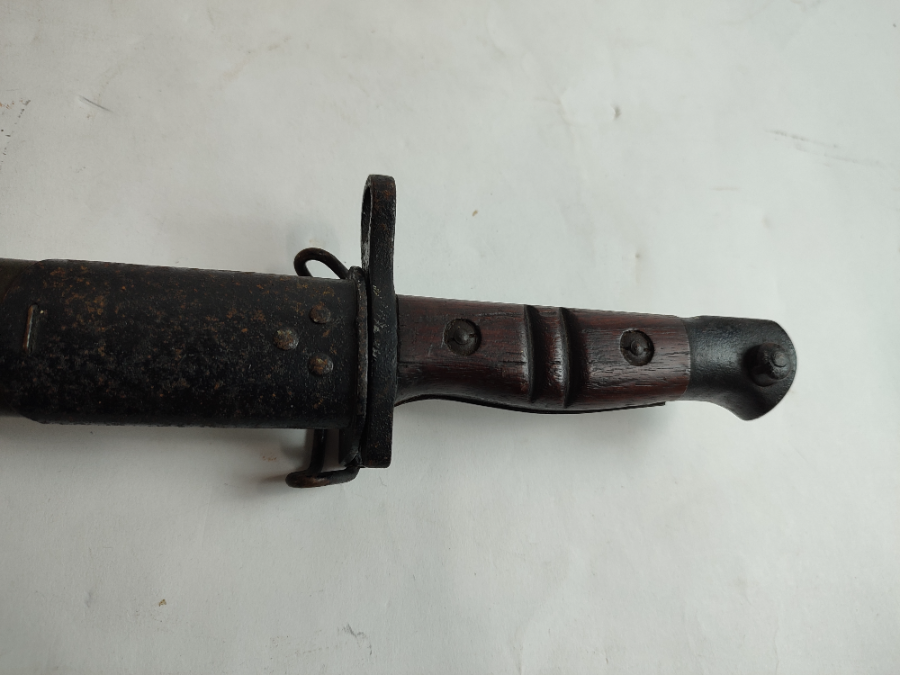 Discover a rich piece of history with our American pattern 1913 bayonet, dated September 1917. In good condition. Shop now for a step back in time!