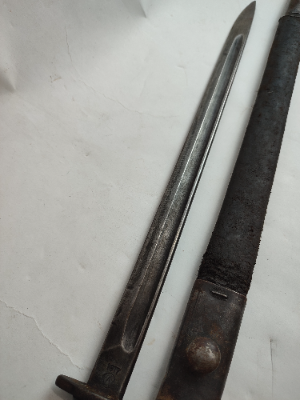 Discover our unique Winchester P1913 dated 1917 bayonet collection– marked, tested, and authentic. Despite its wear, it maintains its historical charm. Own a piece of history now!