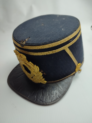 Discover our 1869 Lancashire Fusiliers Regiment Shako, formerly owned by Champion Jones Esq. Made by renowned C Smith and Sons. Act now, own a piece of history!