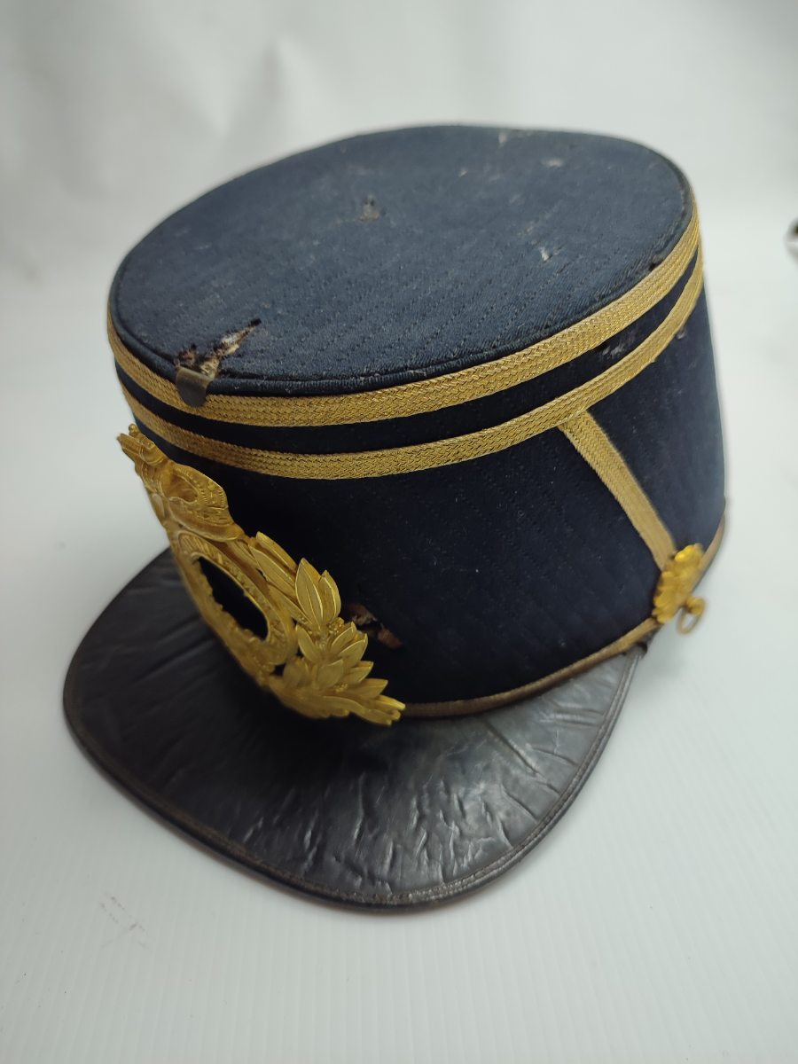 Discover our 1869 Lancashire Fusiliers Regiment Shako, formerly owned by Champion Jones Esq. Made by renowned C Smith and Sons. Act now, own a piece of history!