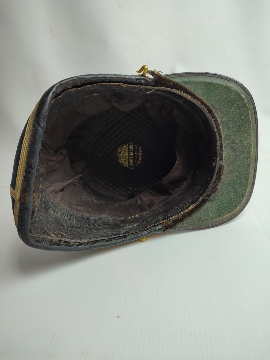 Discover our 1869 Lancashire Fusiliers Regiment Shako, formerly owned by Champion Jones Esq. Made by renowned C Smith and Sons. Act now, own a piece of history!