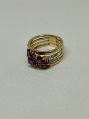 Discover our stunning 9ct gold diamond and garnet dress ring, hallmarked in Birmingham 2009. Weighing 4.3g, it's a perfect size N. Shop now for unique elegance!