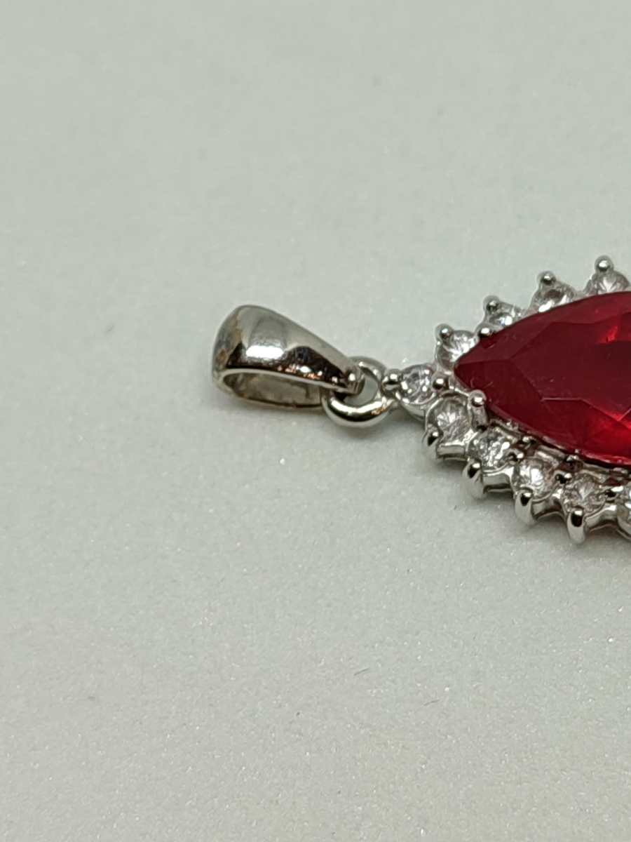9ct White Gold Pear Shape Ruby And Zircon Pendant And The Certificate