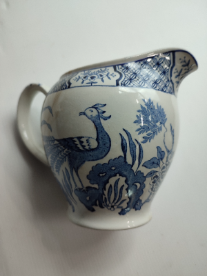 Discover our exquisite Yuan ceramic jug by Wood & Sons Ltd, post 1907. Crafted in Trent New Wharf or Stanley Pottery. Add a touch of elegance to your collection today!