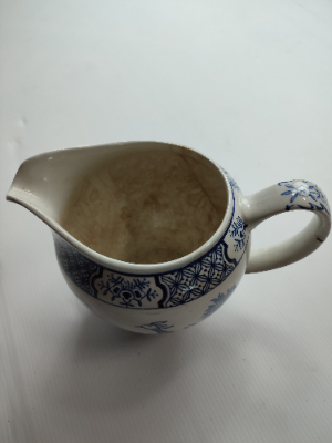 Discover our exquisite Yuan ceramic jug by Wood & Sons Ltd, post 1907. Crafted in Trent New Wharf or Stanley Pottery. Add a touch of elegance to your collection today!