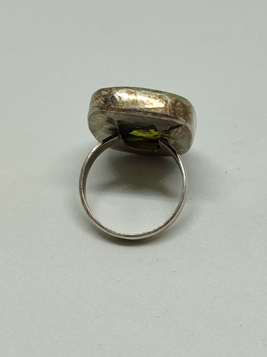 Explore our range of silver rings with genuine copper peridot. Unique designs, top-quality materials. Shop now and find your perfect piece of jewellery!