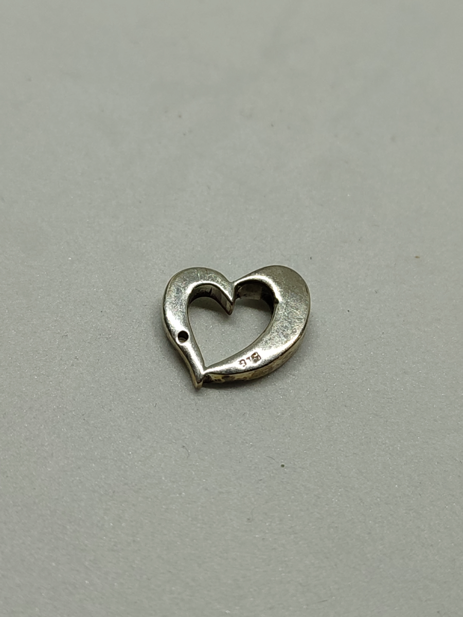 Silver Charm Pendant