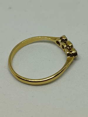 Discover our 18ct gold three stone diamond ring. Featuring 0.40ct diamonds, weighing 2.3g, and available in size R/S. Shop now for timeless elegance.