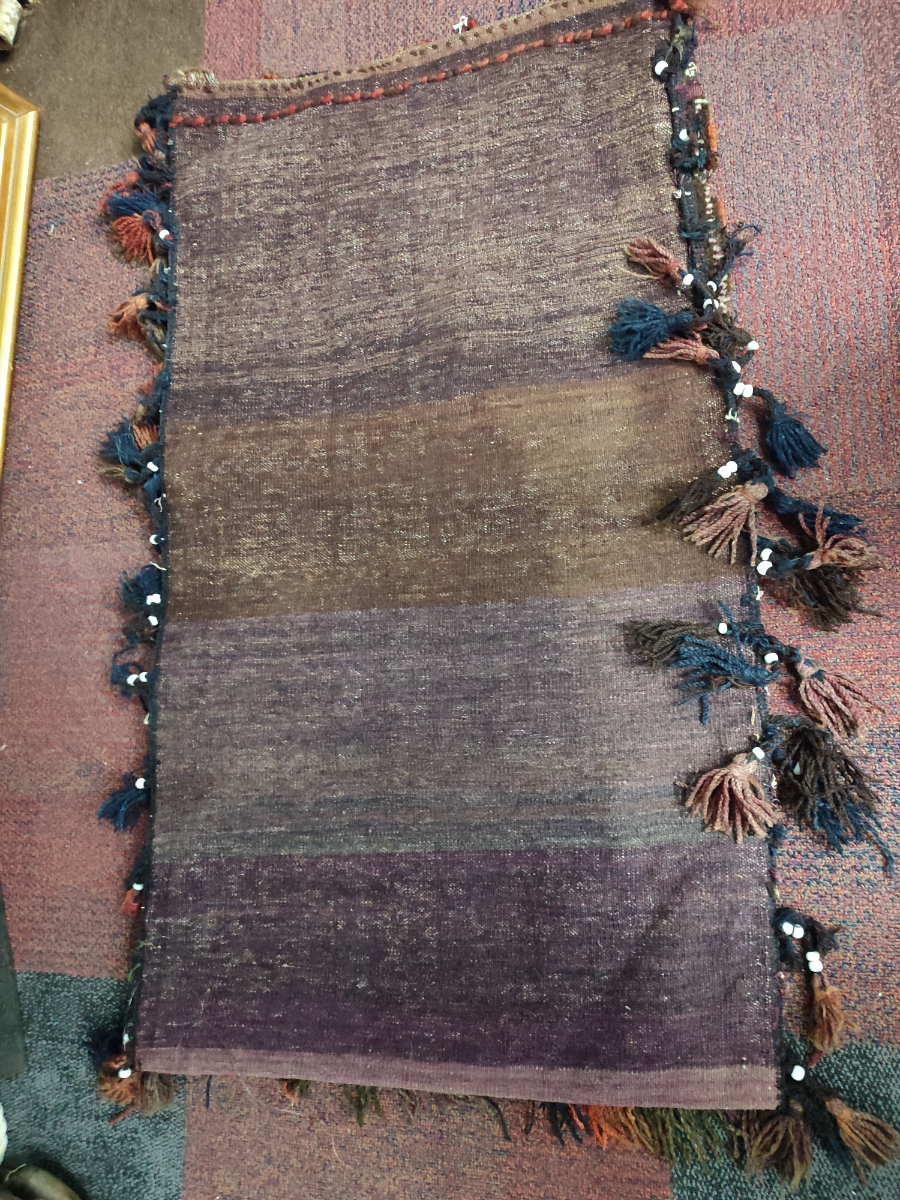 Discover unique and captivating Persian camel saddle bags. Explore our collection today, and get your perfect size 105 x 64cm bag. Start your journey now!