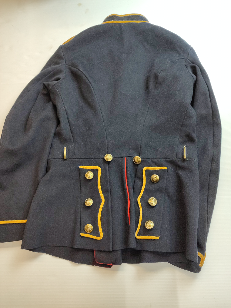 Explore our collection of Royal Field Artillery musicians tunics. This 1909 piece, named to J Foster, stands out with later blue facings and bandsman buttons. Shop now and own a piece of history!
