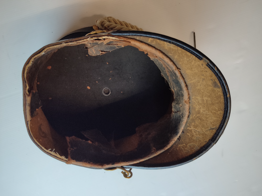 Discover rare 7th New York National Guard regiment shako from the early 20th century by Ridabock & Co, US. Note: Fragile condition. Explore now!