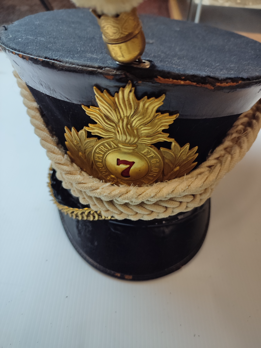 Discover rare 7th New York National Guard regiment shako from the early 20th century by Ridabock & Co, US. Note: Fragile condition. Explore now!