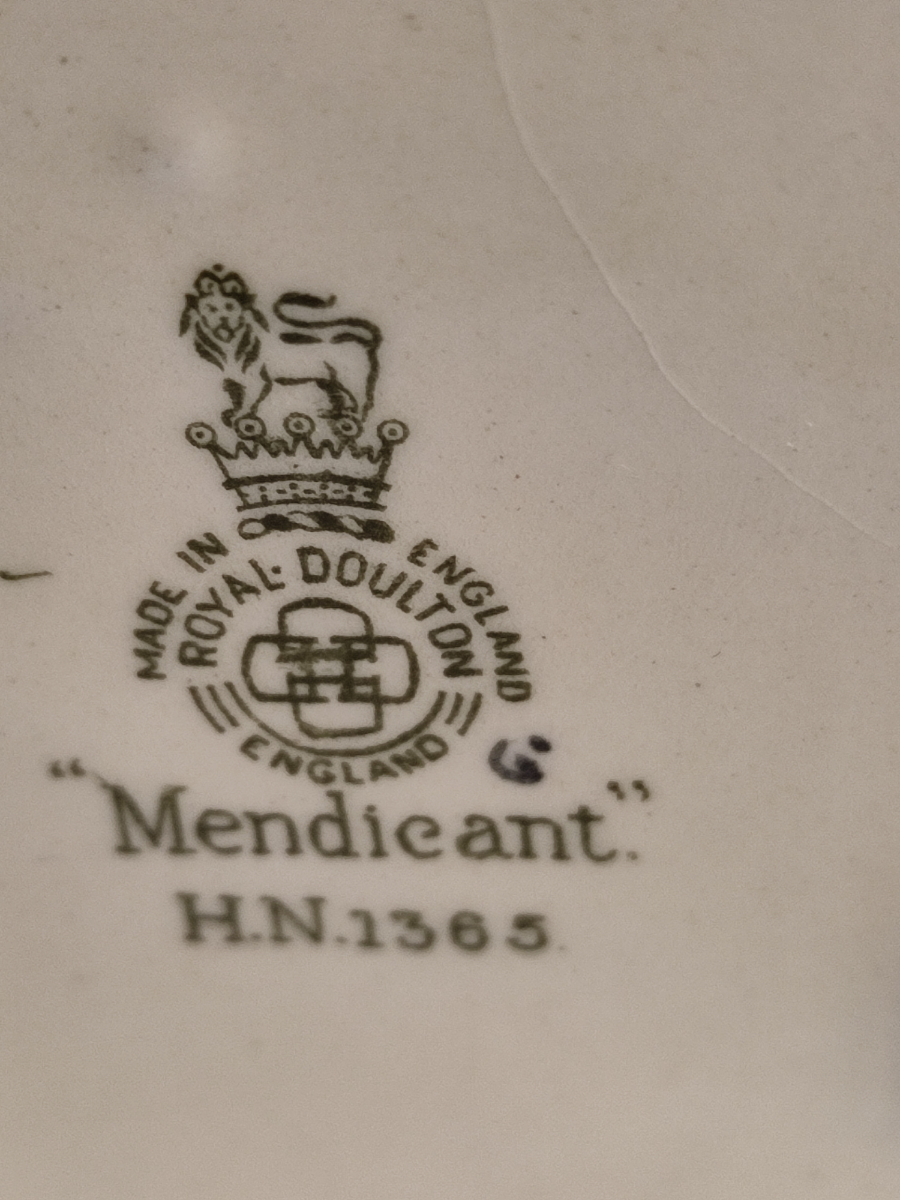 Discover the limited-edition Royal Doulton Mendicant HN 1365 figurine. Designed by Leslie Harradine between 1929 - 1969. In excellent condition and 22cm tall. Shop now.