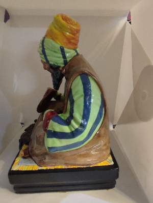 Discover our Royal Doulton Cobbler figurine, designed by Charles Noke. Issued between 1922-1939, gracefully 22cm tall and in prime condition. Shop now!