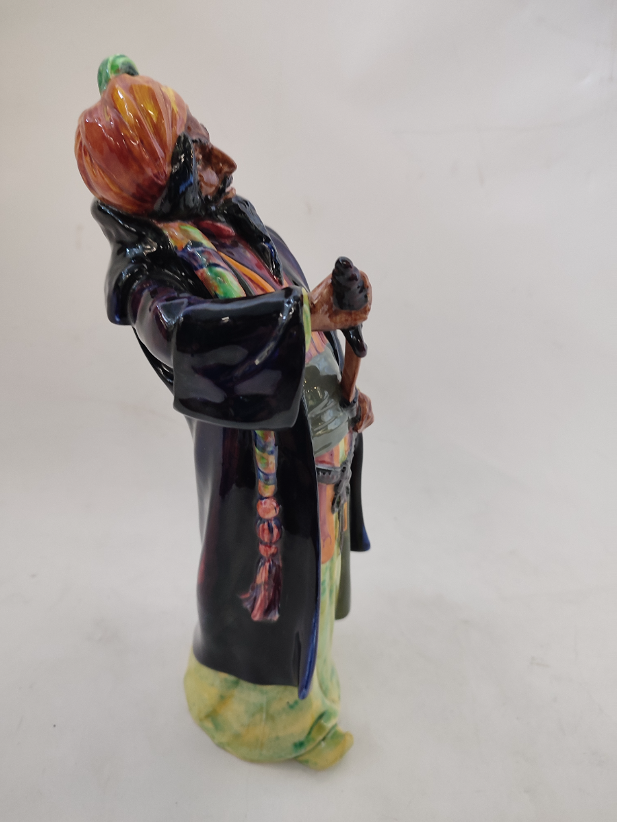 Discover our Royal Doulton figurine, a vintage gem from 1952. Add the memorable blue-beard man HN2105 to your collection today. Shop now to secure this rare piece!