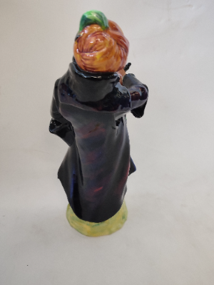 Discover our Royal Doulton figurine, a vintage gem from 1952. Add the memorable blue-beard man HN2105 to your collection today. Shop now to secure this rare piece!