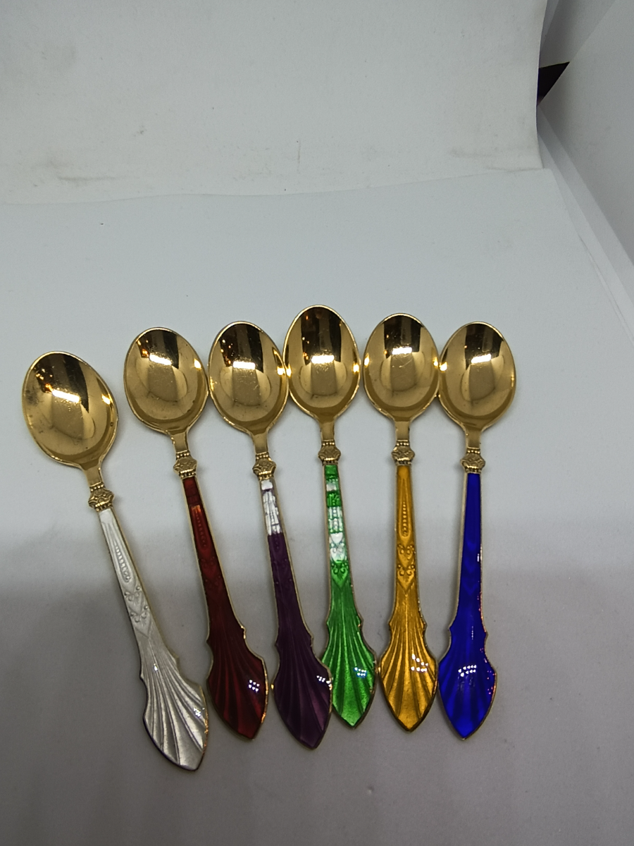 Explore our Meka sterling silver enamel Spoon set straight from Copenhagen, Denmark. Order now and treasure the renowned enamel designs despite minor imperfections. Hurry!