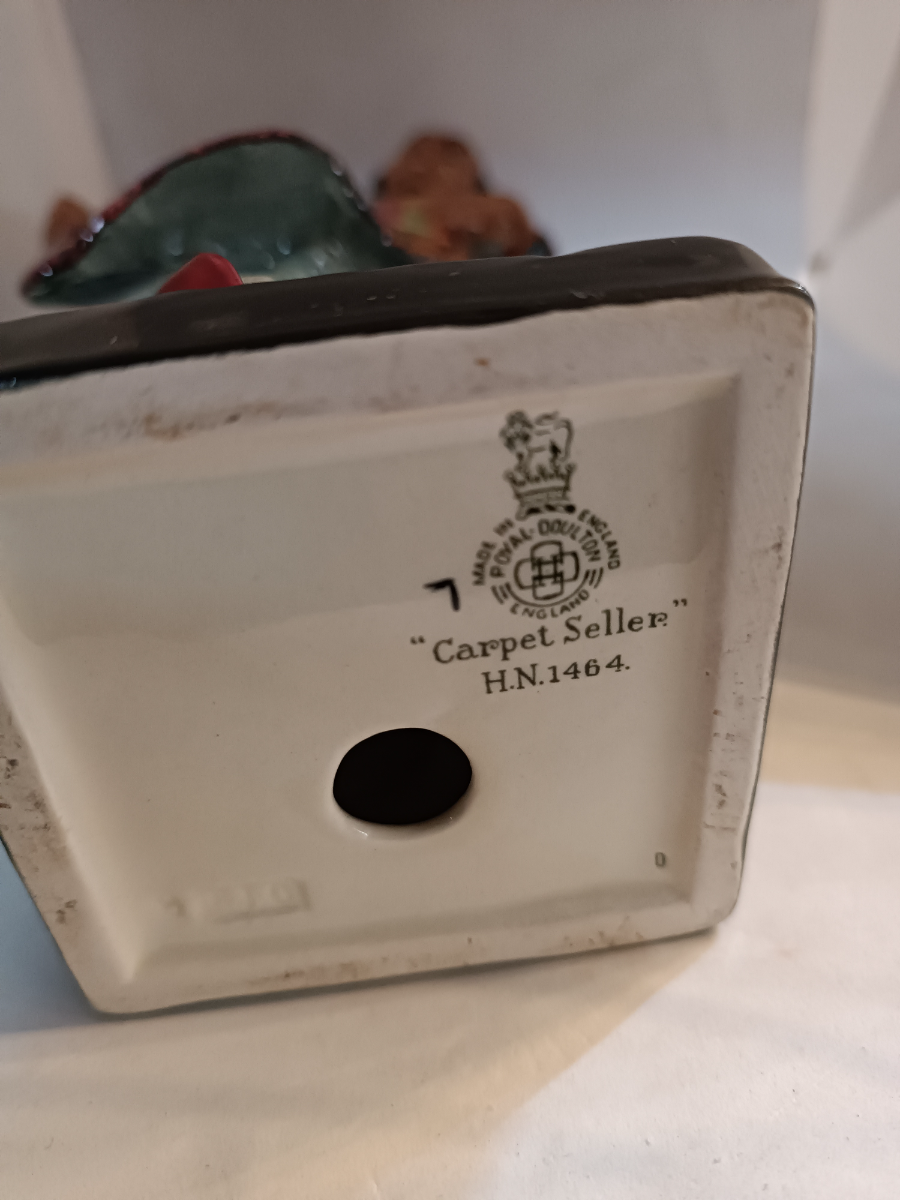 Discover our Royal Doulton Carpet Seller figure designed by Charles Noke. Shop now to bring home this 23cm porcelain masterpiece in good condition.