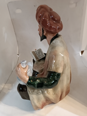 Shop our Royal Doulton Omar Khayyam figure, an exquisite piece of discontinued porcelain crafted by Mary Nicole. Perfect for collectors - secure yours today!