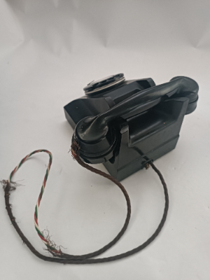 Discover our 20th c. Bakelite telephones in Warrington. Featuring a wire and pullout tray. Order yours today! Relive history with a touch of elegance.