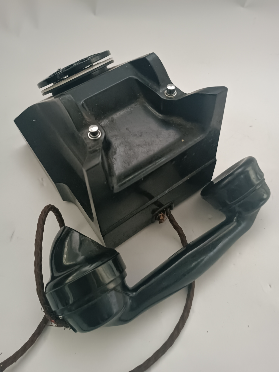 Discover our 20th c. Bakelite telephones in Warrington. Featuring a wire and pullout tray. Order yours today! Relive history with a touch of elegance.