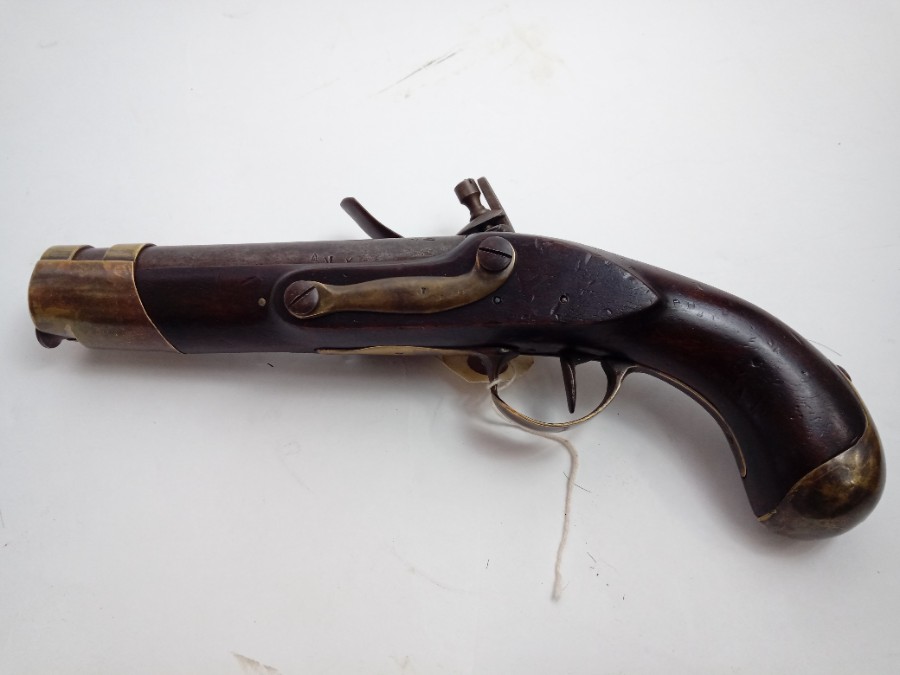 Discover our rare French 1770 Flintlock pistol with a unique brass plate. Made of composite stock. Shop now for this must-have antique firearm!