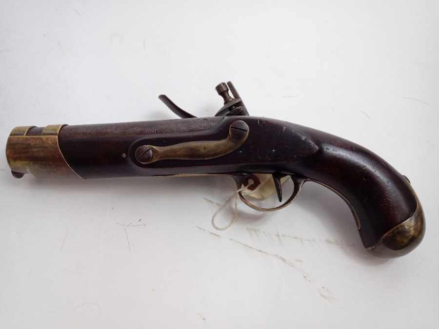 Discover our rare French 1770 Flintlock pistol with a unique brass plate. Made of composite stock. Shop now for this must-have antique firearm!