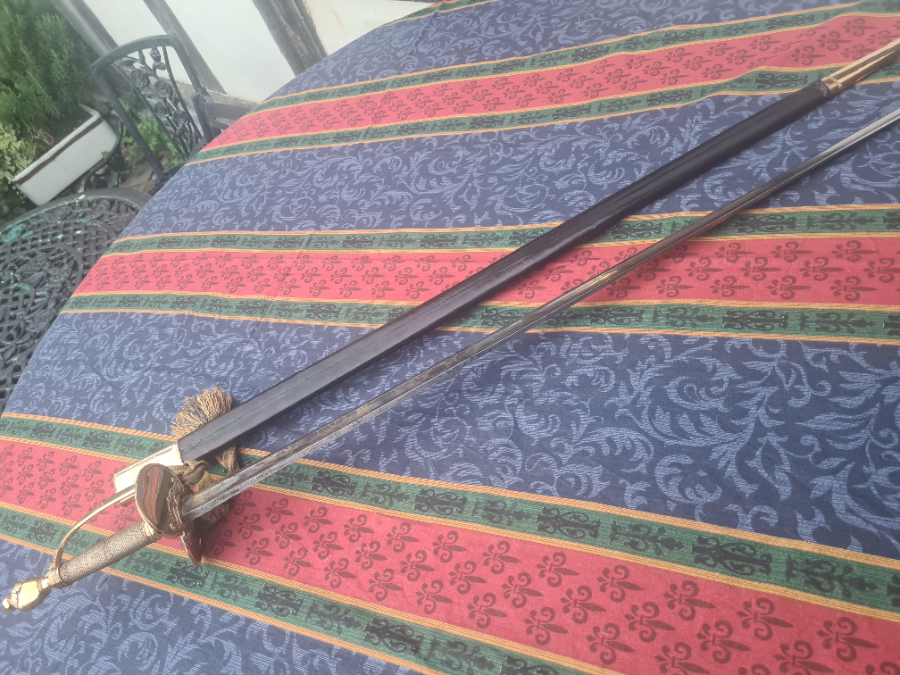 Discover our selection of 1800-era swords, featuring a pristine 1796 Infantry Officers blue gilt sword by S. Brunn. Restored scabbard included. Shop now for this piece of history!