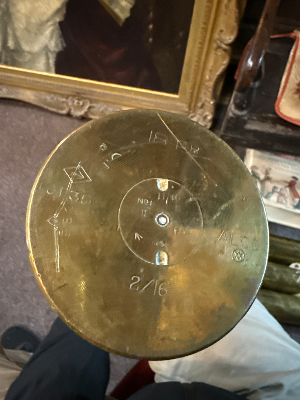 An 18 pounder artillery round dated February 1916. Fuse no longer screws to casing. Length 56cm.