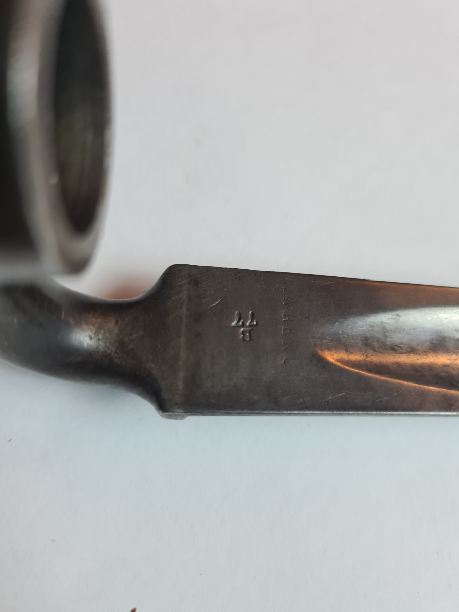 Explore the historic 1872 Martini Henry bayonet, stamped B77 by inspector and crafted by T.W Renot. Excellent condition, sans scabbard. See it now!