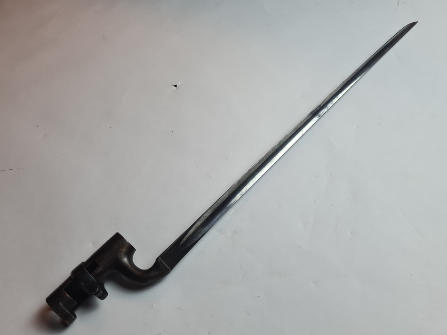 Explore the historic 1872 Martini Henry bayonet, stamped B77 by inspector and crafted by T.W Renot. Excellent condition, sans scabbard. See it now!