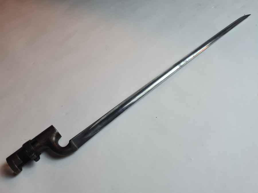 Explore the historic 1872 Martini Henry bayonet, stamped B77 by inspector and crafted by T.W Renot. Excellent condition, sans scabbard. See it now!