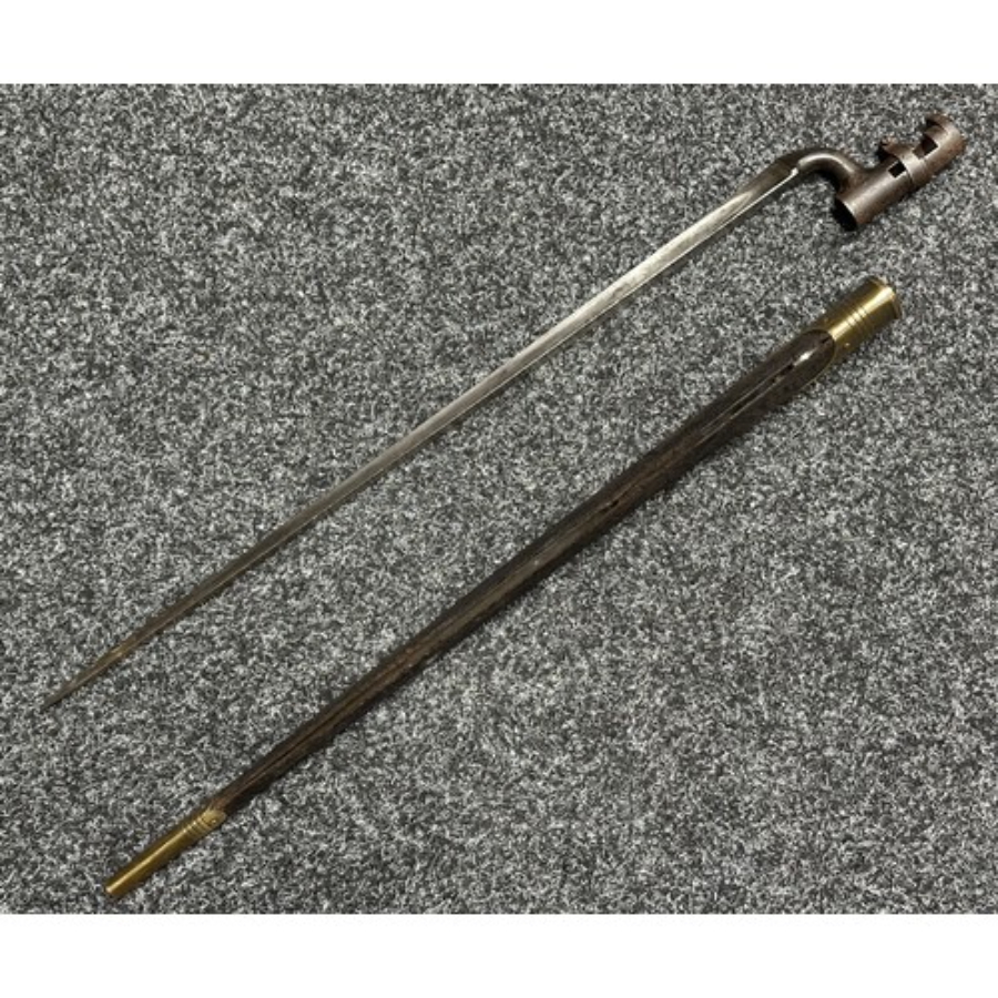 Primary image for A lovely 1876 Martini Henry socket bayonet with a scabbard has sold out. It bears service stamps and is WD marked, inspected by Enfield.