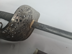 Discover our authentic 1897 George V Officers Dress Sword by T.G Phillips. Sourced straight from Dublin, it comes complete with a scabbard. Buy now.