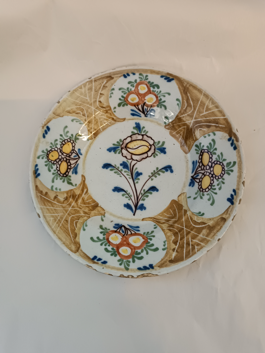 uploads/18th-Century-Polychrome-Delftware-Pottery-Plate-216920512a5f910aws.jpg