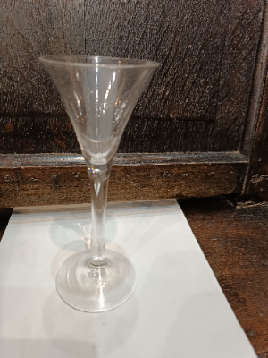 Explore our collection of mid 18th century Georgian toasting Glasses. Featuring lead glass with snapped pontil and a unique air tear. Order now for the perfect toast!