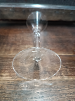 Explore our collection of mid 18th century Georgian toasting Glasses. Featuring lead glass with snapped pontil and a unique air tear. Order now for the perfect toast!
