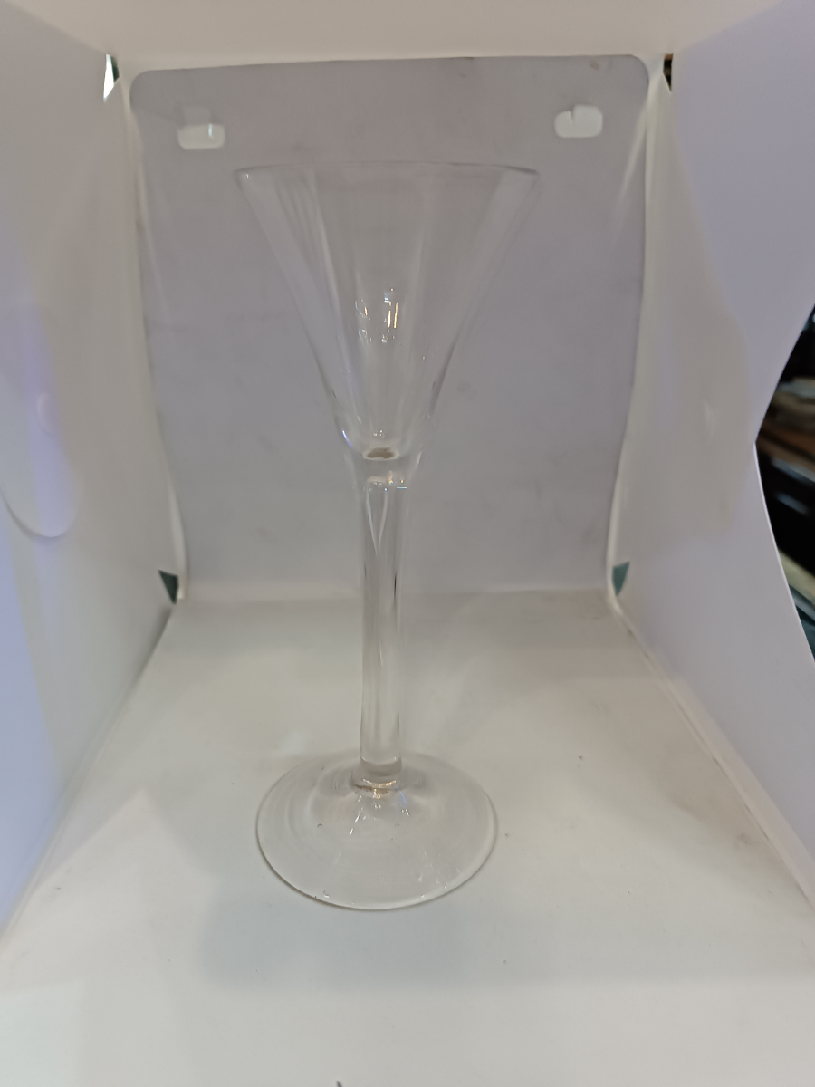 Explore our collection of mid 18th century Georgian toasting Glasses. Featuring lead glass with snapped pontil and a unique air tear. Order now for the perfect toast!