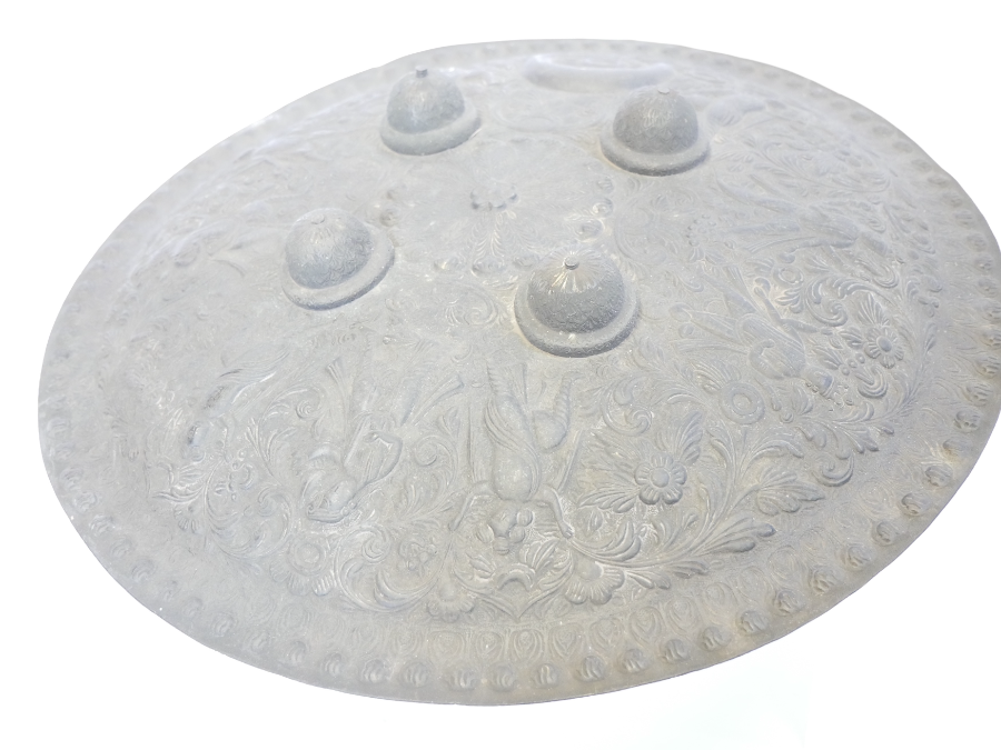 Explore our range of 18th/19th century Indo/Persian Dhal shields. Adorned with floral designs and crescent moon motifs. Perfect for history enthusiasts. Shop now!