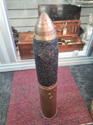 Discover our selection of 1916-dated 18-pounder inert artillery shells and casings. High quality, historical artifacts. Shop now to add to your collection!