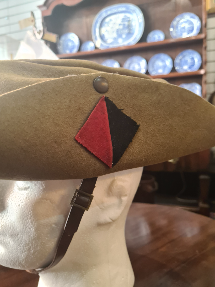 Explore our collection of 1942-dated Royal Artillery enlisted slouch caps by Atherton. Featuring 4 vents, chinstrap, and liner in good condition! Shop now.